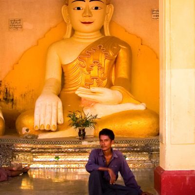 Young man and Buddha