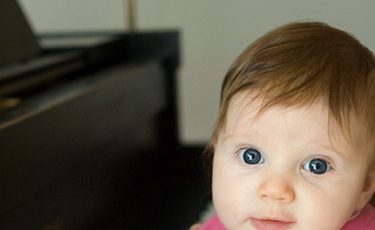 Mia at the piano