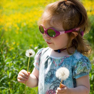 Mia and dandelions